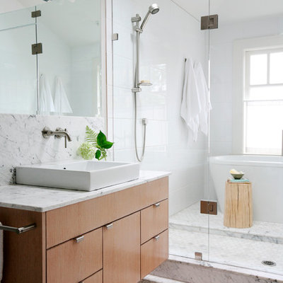 Trendy bathroom photo in Vancouver with a vessel sink and white countertops