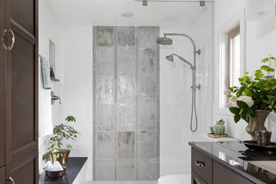 Example of a mid-sized transitional master white tile and glass tile porcelain tile and gray floor bathroom design in Seattle with dark wood cabinets, white walls, an undermount sink and gray countertops
