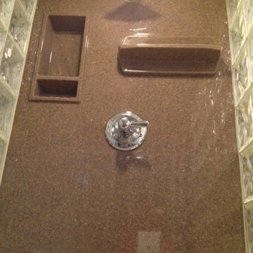 Solid surface walls and shampoo niche