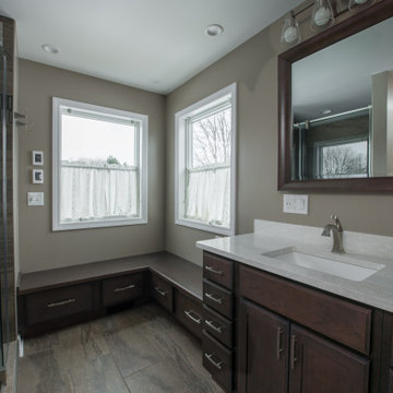 Sophisticated Master Bathroom with Window Seating