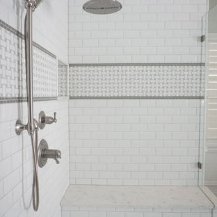 Example of a large classic master white tile and subway tile porcelain tile bathroom design in St Louis with an undermount sink, beaded inset cabinets, dark wood cabinets, quartzite countertops and green walls