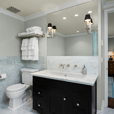 Bathroom - traditional gray tile bathroom idea in Los Angeles with an undermount sink, shaker cabinets, black cabinets, a two-piece toilet and gray walls