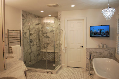 Design ideas for a large traditional ensuite bathroom in Cleveland with shaker cabinets, white cabinets, a freestanding bath, a corner shower, a two-piece toilet, white tiles, marble tiles, white walls, marble flooring, a submerged sink, marble worktops, white floors, a hinged door and white worktops.