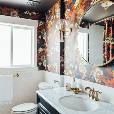 Mid-sized eclectic 3/4 white tile and ceramic tile porcelain tile and white floor bathroom photo in Salt Lake City with shaker cabinets, blue cabinets, a one-piece toilet, multicolored walls, an integrated sink, marble countertops and white countertops