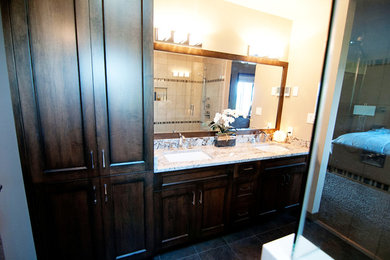 Bathroom - mid-sized transitional master bathroom idea in Vancouver with shaker cabinets, brown cabinets and granite countertops