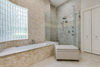 Medium sized classic ensuite bathroom in Dallas with raised-panel cabinets, white cabinets, a submerged bath, a corner shower, beige tiles, mosaic tiles, beige walls, ceramic flooring, a submerged sink, quartz worktops, beige floors and a hinged door.