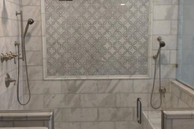 Inspiration for a large timeless white tile and marble tile marble floor and white floor corner shower remodel in Philadelphia with marble countertops, a hinged shower door and white countertops
