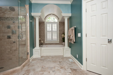 Example of a mid-sized transitional master bathroom design in Other with blue walls and a hinged shower door