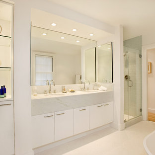 Bathroom - contemporary blue tile and subway tile bathroom idea in Boston with an undermount sink, flat-panel cabinets and white cabinets