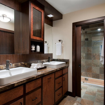 Bathroom - large contemporary multicolored tile and slate tile slate floor bathroom idea in San Francisco with a vessel sink, furniture-like cabinets, medium tone wood cabinets, marble countertops, a one-piece toilet and beige walls