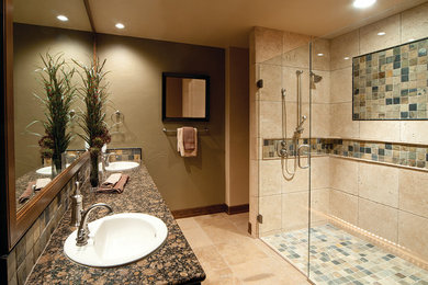 Example of a large tuscan master beige tile, multicolored tile and travertine tile travertine floor and beige floor walk-in shower design in New York with green walls, a drop-in sink, granite countertops and a hinged shower door
