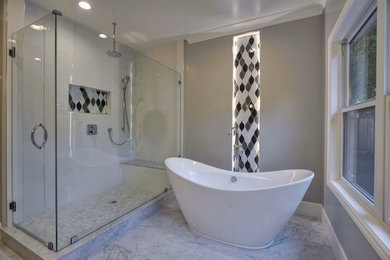 Inspiration for a large contemporary master white tile and porcelain tile marble floor bathroom remodel in San Francisco with shaker cabinets, white cabinets, white walls, an undermount sink and marble countertops