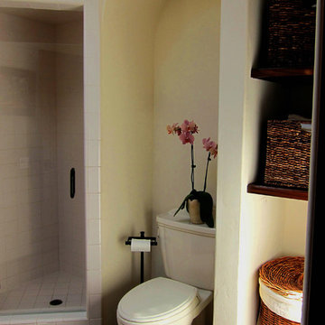 Spanish style Barrel Niche above toilet