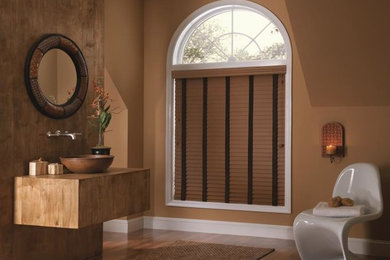 Inspiration for a master medium tone wood floor bathroom remodel in Wilmington with medium tone wood cabinets, brown walls, a vessel sink and wood countertops
