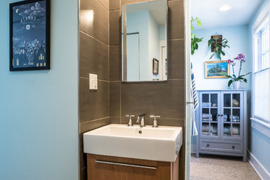 Example of a trendy bathroom design in Boston with a wall-mount sink