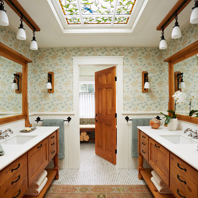 Elegant master white tile and stone tile marble floor bathroom photo in Minneapolis with medium tone wood cabinets, an undermount sink and green walls