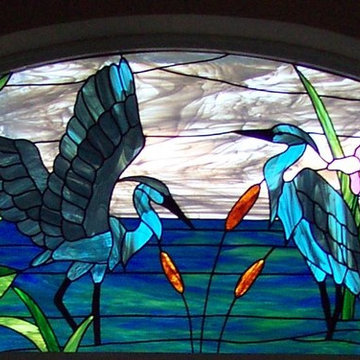 Stained glass window depicting Herons