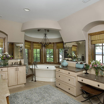 Stained Oak Master Bathroom Cabinetry by Wood-Mode with Stained Concrete Counter