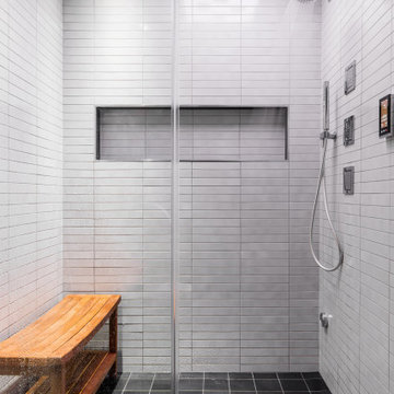 Stand up Shower featuring Kohler Shower Panel, Jets, Handshower and Speakers