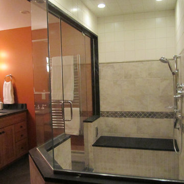 Steam shower in tile and soapstone