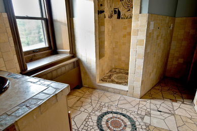 Example of a mid-sized eclectic master beige tile, multicolored tile and ceramic tile ceramic tile alcove shower design in Philadelphia with blue walls