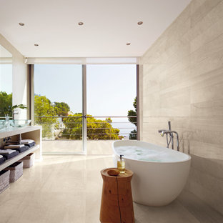 Large trendy master white tile and porcelain tile porcelain tile and beige floor freestanding bathtub photo in San Francisco with open cabinets, a vessel sink, brown cabinets and beige walls