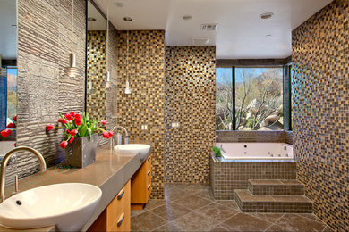 Inspiration for a contemporary master multicolored tile and mosaic tile brown floor bathroom remodel in Other with flat-panel cabinets, brown cabinets, a hot tub, brown walls and a drop-in sink