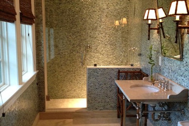 Alcove shower - mid-sized transitional 3/4 ceramic tile and beige floor alcove shower idea in Charleston with a one-piece toilet, green walls, a console sink, granite countertops and a hinged shower door