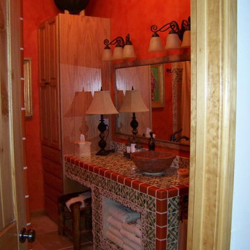 Storage closet remodeled to add a full bathroom, with talavera tile and other tr
