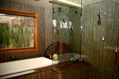 Example of a mid-sized transitional master gray tile and porcelain tile drop-in bathtub design in Denver with multicolored walls