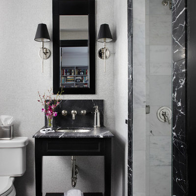 Example of a mid-sized trendy 3/4 white tile, gray tile and stone tile marble floor alcove shower design in Chicago with an undermount sink, furniture-like cabinets, black cabinets, a two-piece toilet, gray walls, marble countertops and gray countertops
