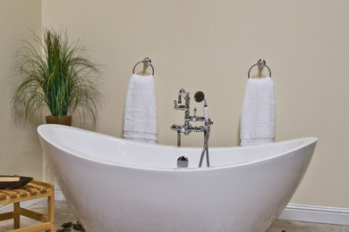 Example of a mid-sized minimalist master freestanding bathtub design in Sacramento