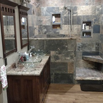 Stunning craftsman style ster bath with slate look porcelain tile walk in shower