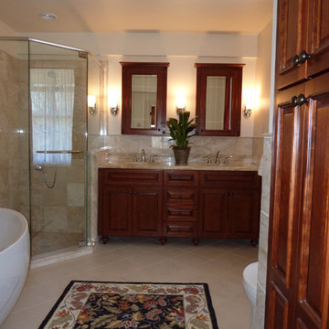 Stunning traditional bathroom with custom neo-angle shower and free-standing bat