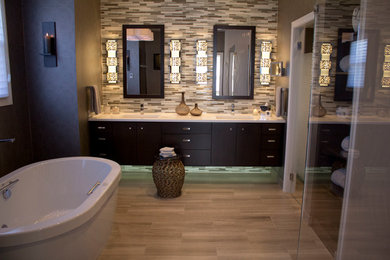 Bathroom - mid-sized transitional master beige tile, brown tile and matchstick tile bathroom idea in Cleveland with flat-panel cabinets, brown cabinets, brown walls, an undermount sink, quartz countertops and a hinged shower door