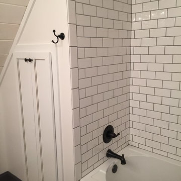 Subway tile around an inexpensive tube makes a big difference