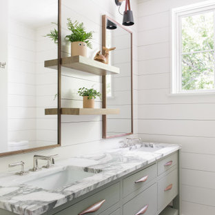 Inspiration for a coastal double-sink, shiplap ceiling and shiplap wall bathroom remodel in Charleston with flat-panel cabinets, white walls, an undermount sink, multicolored countertops and a freestanding vanity