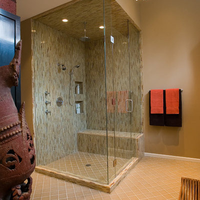 Example of a trendy matchstick tile and beige tile corner shower design in Chicago