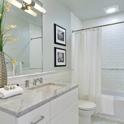 Elegant bathroom photo in Seattle with marble countertops