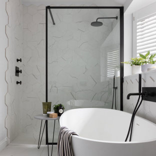 Design ideas for a small contemporary family bathroom in Sussex with a freestanding bath, porcelain tiles, an open shower, a built-in shower, white tiles and white floors.