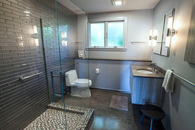 Bathroom - mid-sized contemporary 3/4 concrete floor bathroom idea in Boston with gray walls