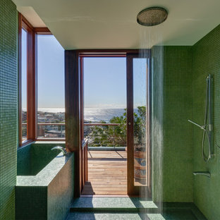 Inspiration for a tropical wet room bathroom in Sydney with a corner tub, green tile, mosaic tile, mosaic tile floors, green floor and an open shower.