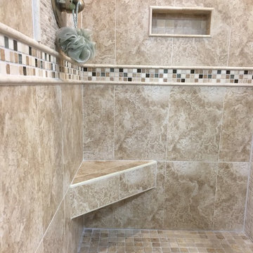 Tan Shower with Decorative Tile Insert
