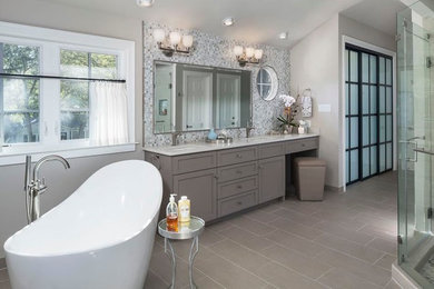 Large trendy master gray tile and mosaic tile porcelain tile bathroom photo in Austin with shaker cabinets, gray cabinets, beige walls, an undermount sink and quartz countertops