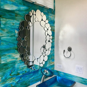 Teal Glass Bath with Blue Vessel Sink