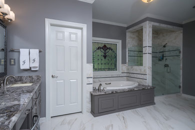 Bathroom - traditional multicolored tile bathroom idea in Little Rock with raised-panel cabinets, gray cabinets and granite countertops