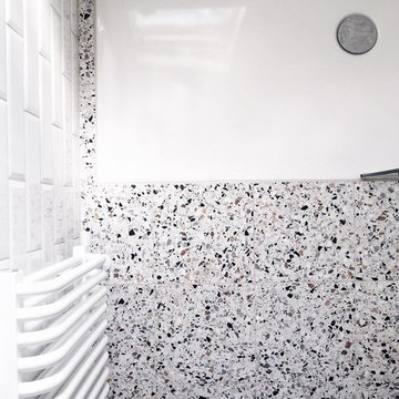 Terrazzo Tile floor with White Metro Tiles in a Contemporary Shower Room