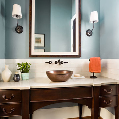 Example of a large transitional 3/4 white tile and ceramic tile medium tone wood floor bathroom design in Portland with a vessel sink, furniture-like cabinets, dark wood cabinets, blue walls, quartz countertops and beige countertops