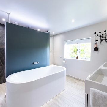 The bath is the heart of this bathroom