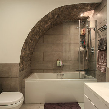 the bath under the stairs